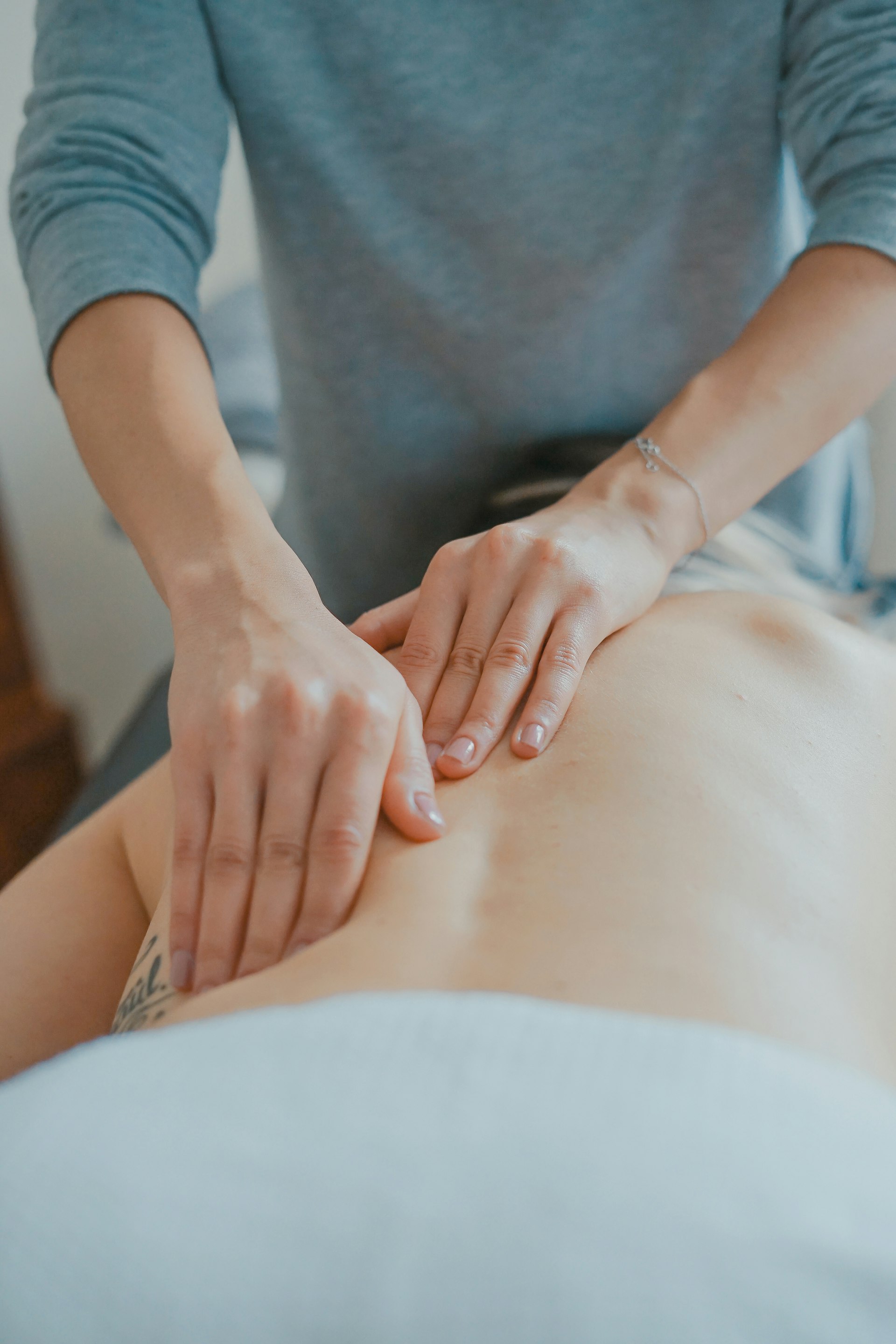 Deep tissue massage targeting upper back and shoulder tension